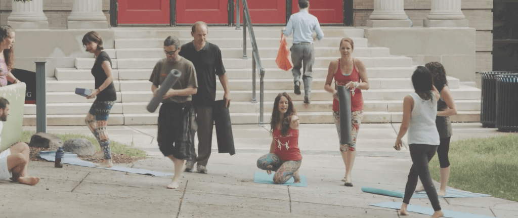 Yoga in front of education building