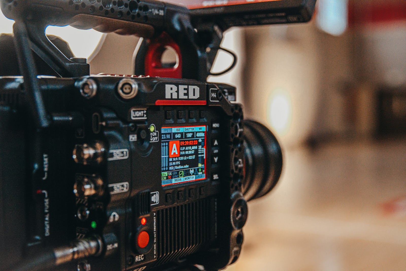 Close-up of a RED cinema camera recording high-quality footage for an explainer video production.