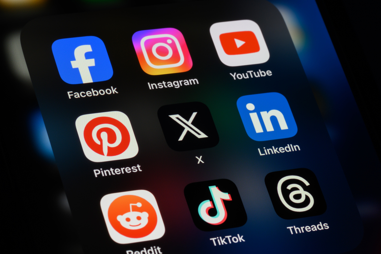 Social media apps on smartphone for promoting budget video production content