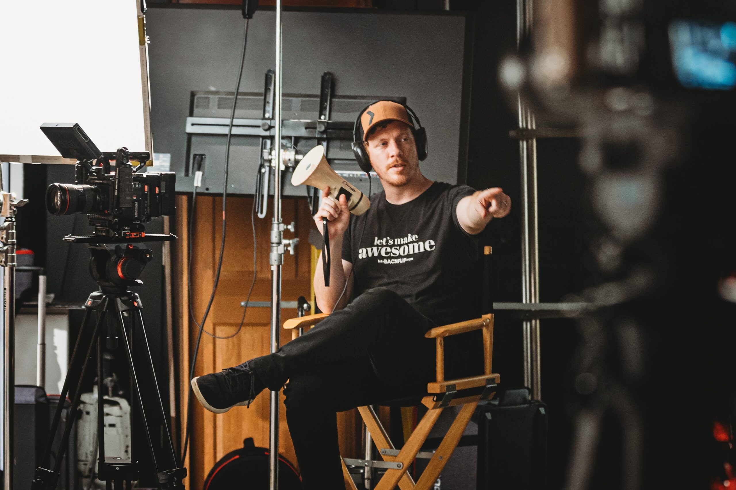 Backflip director leads a video production shoot, representing full-service offerings like brand videos, live streaming, promotional videos, and social media content