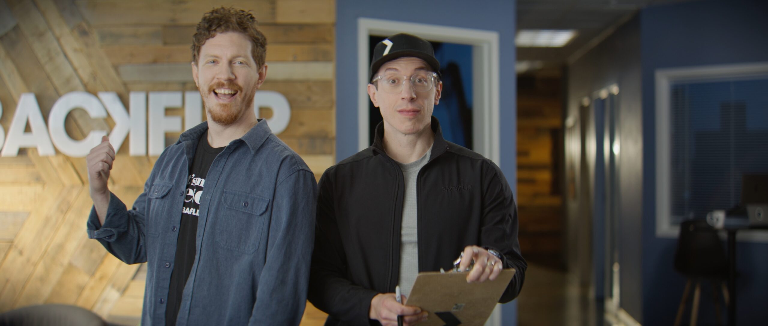Behind the scenes of a Backflip commercial, featuring two video producers in the studio—capturing the energy and expertise of a commercial video production company