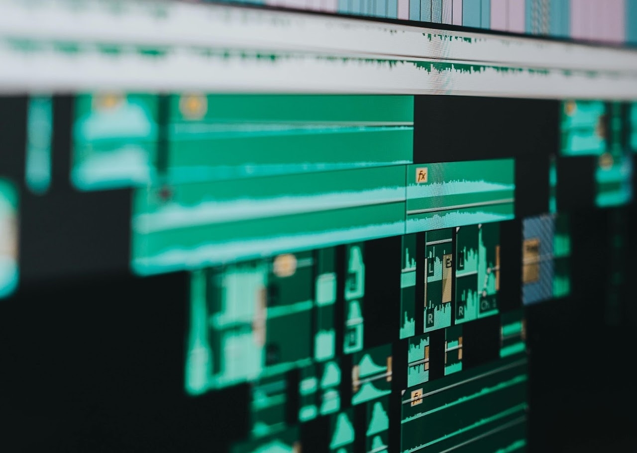 Professional video editing timeline showcasing color grading and audio management tools