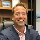 Stephen Pfeil, business owner of Global Coin in Madison, WI, shares a 5-star review of Backflip’s professional commercial video production services
